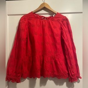 Cute red eyelet 100% cotton top by Madewell, peplum style, back tie at neck.